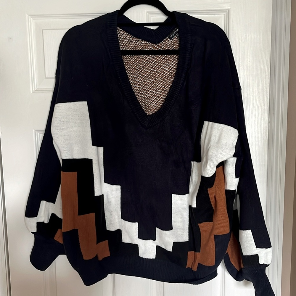 Never worn blue cream, white brick, orange black knitted sweater! 😏🍂